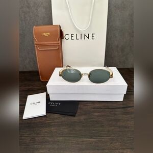 Celine Triomphe sunglasses gold color